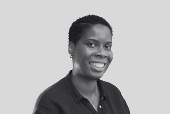 A Black woman smiling